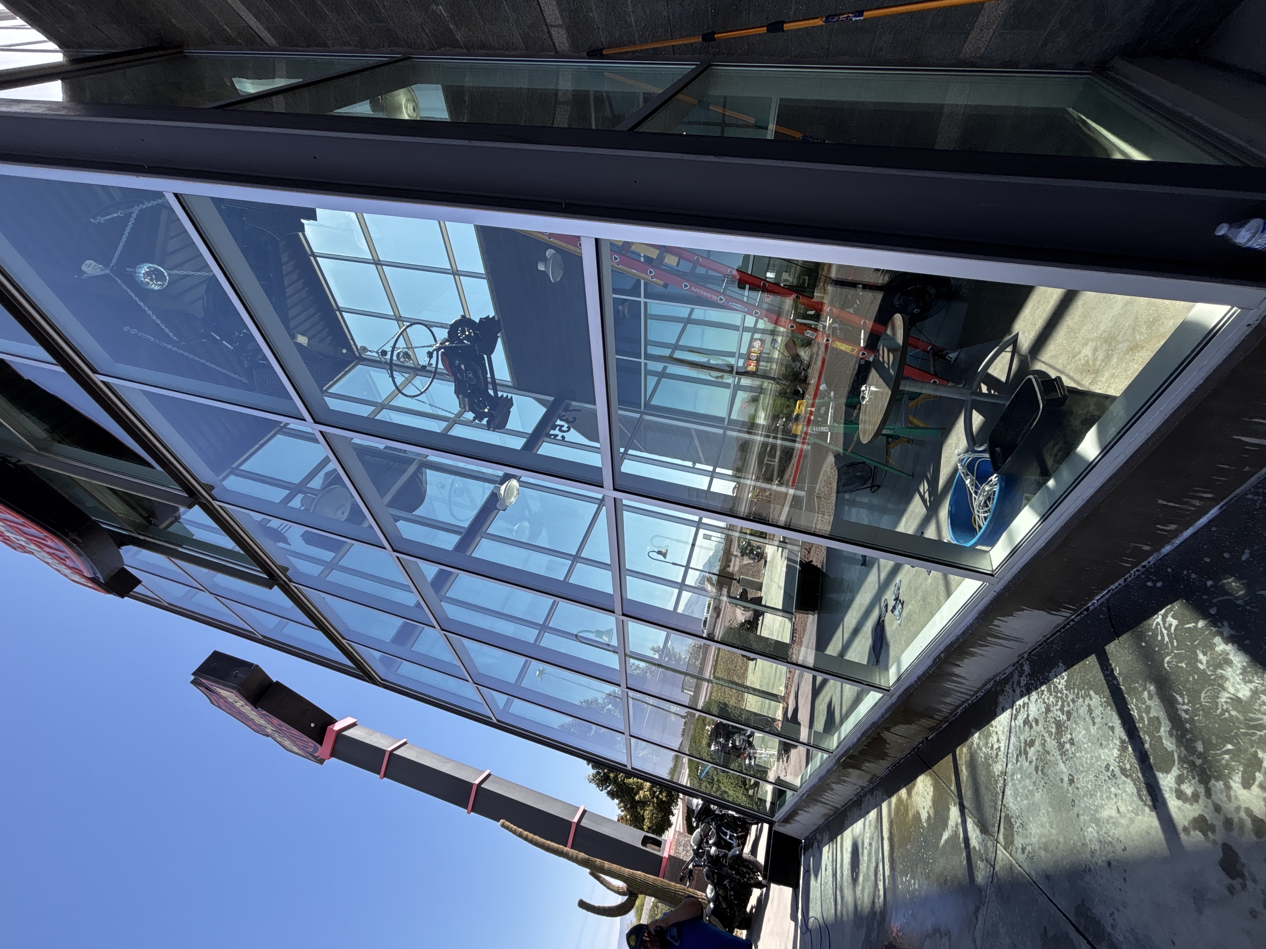 Sparkling clean window with blue sky
